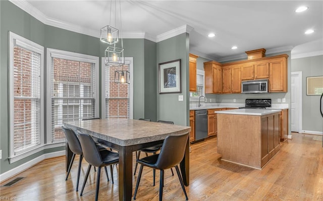106 Edith Wharton Sq, Newport News, VA 23606 - kitchen featuring stainless steel microwave, black range oven, a center island, light countertops, and dishwashing machine