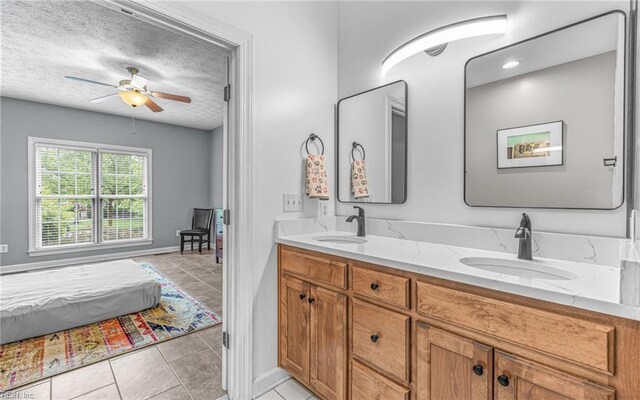 106 Edith Wharton Sq, Newport News, VA 23606 - full bath featuring double vanity, ceiling fan, tile patterned floors, and a textured ceiling
