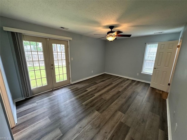 2304 Londale Ct, Virginia Beach, VA 23456 - spare room with a ceiling fan, healthy amount of natural light, french doors, a textured ceiling, and dark wood-style flooring