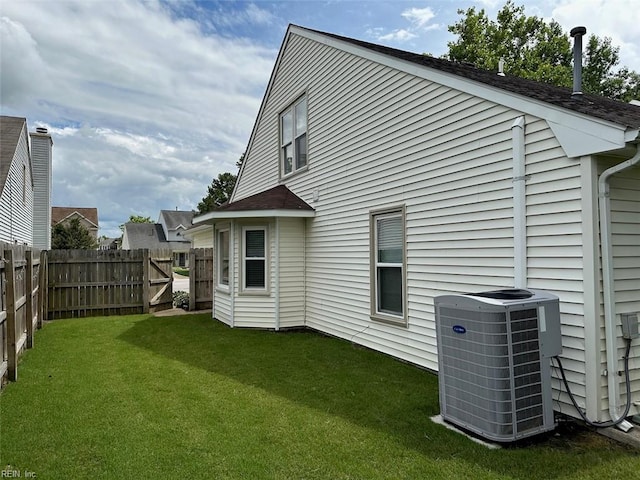 2304 Londale Ct, Virginia Beach, VA 23456 - rear view of house featuring central air condition unit and a shingled roof