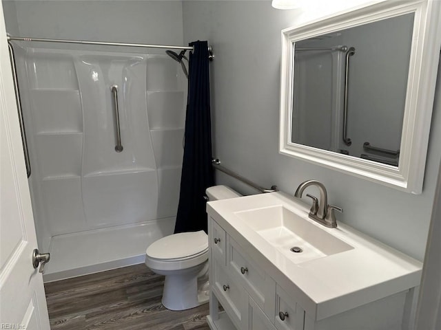 2304 Londale Ct, Virginia Beach, VA 23456 - full bath featuring toilet, wood finished floors, vanity, and a shower with curtain