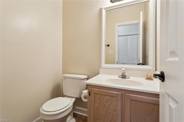 947 Willow Pt, Newport News, VA 23602 - bathroom featuring vanity, toilet, and baseboards