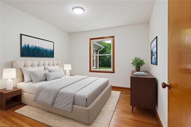702 Blair Ave, Hampton, VA 23661 - bedroom with light wood-style floors and baseboards