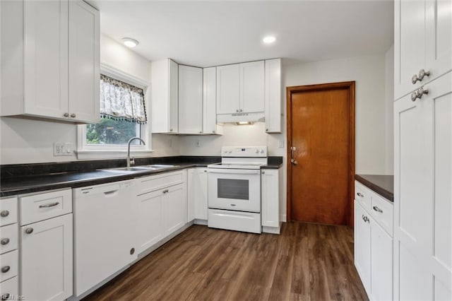 702 Blair Ave, Hampton, VA 23661 - kitchen with white appliances, a sink, under cabinet range hood, dark wood-style flooring, and dark countertops