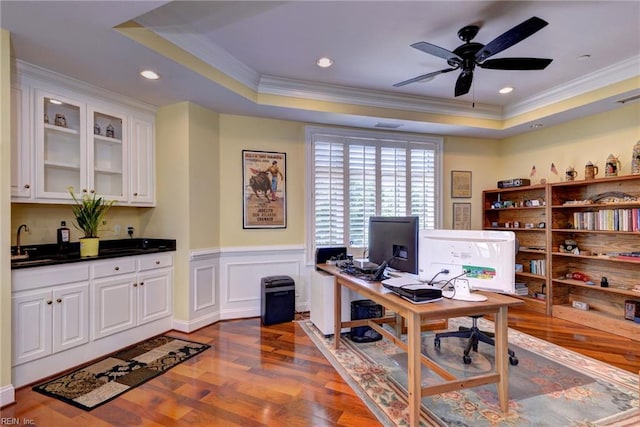 509 River Blfs, Williamsburg, VA 23185 - office featuring ornamental molding, a tray ceiling, dark wood-style flooring, a ceiling fan, and a sink
