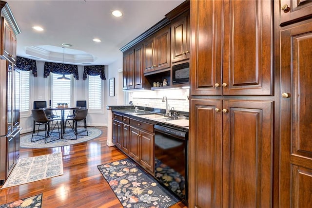 509 River Blfs, Williamsburg, VA 23185 - kitchen featuring black appliances, a sink, a raised ceiling, wood finished floors, and recessed lighting