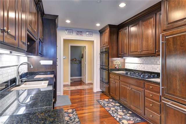 509 River Blfs, Williamsburg, VA 23185 - kitchen featuring gas stovetop, a sink, backsplash, baseboards, and recessed lighting