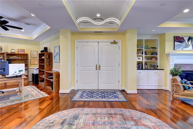 509 River Blfs, Williamsburg, VA 23185 - foyer entrance featuring a tray ceiling, ornamental molding, wood finished floors, ceiling fan, and recessed lighting