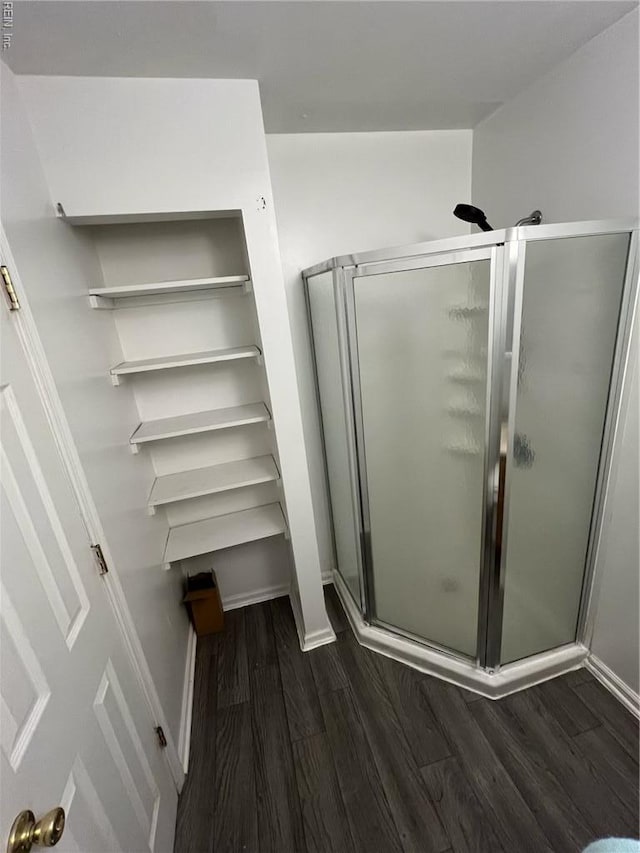 327 Nassau Pl, Hampton, VA 23666 - full bath with wood finished floors, a shower stall, and baseboards