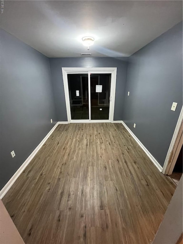 327 Nassau Pl, Hampton, VA 23666 - empty room featuring wood finished floors and baseboards