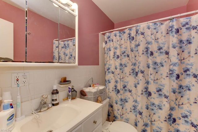 428 Macdonald Cres, Norfolk, VA 23505 - full bathroom featuring tile walls, vanity, toilet, a shower with shower curtain, and a wainscoted wall