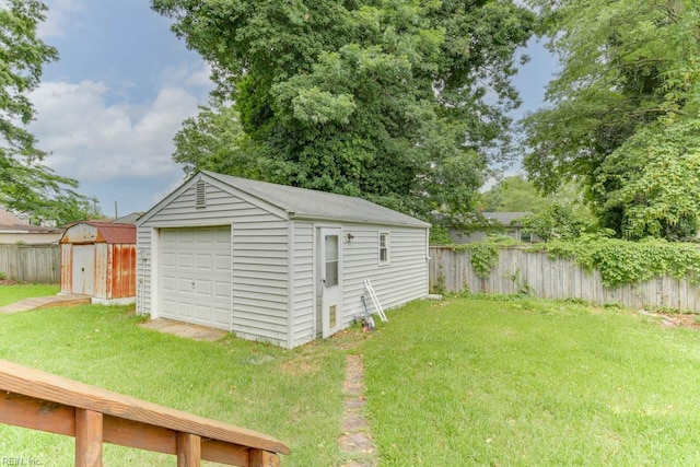 428 Macdonald Cres, Norfolk, VA 23505 - detached garage with a storage unit and driveway