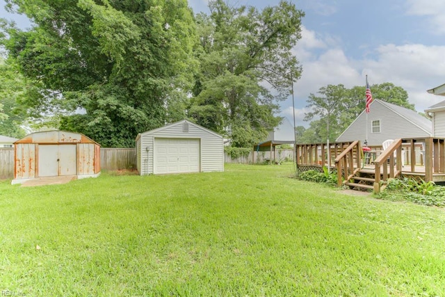 428 Macdonald Cres, Norfolk, VA 23505 - view of yard featuring a garage and a wooden deck