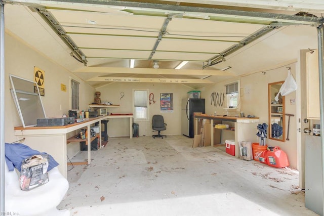 428 Macdonald Cres, Norfolk, VA 23505 - garage featuring freestanding refrigerator and a workshop area