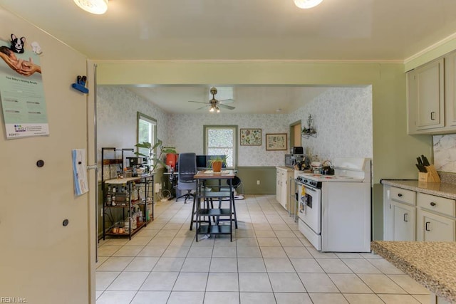 428 Macdonald Cres, Norfolk, VA 23505 - kitchen with white stove, an office area, ceiling fan, light countertops, and wallpapered walls