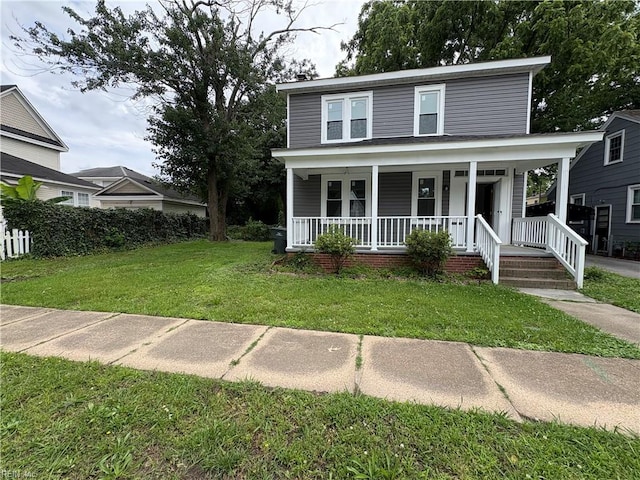 3711 Abingdon Cir, Norfolk, VA 23513 - view of front facade with covered porch and a front lawn