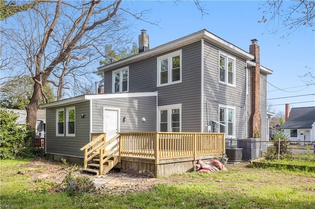 3711 Abingdon Cir, Norfolk, VA 23513 - rear view of house featuring a chimney, a wooden deck, and central AC unit
