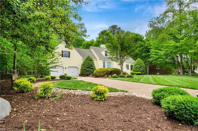 210 John Pott Dr, Williamsburg, VA 23188 - view of front of house with concrete driveway, an attached garage, a front lawn, and a chimney