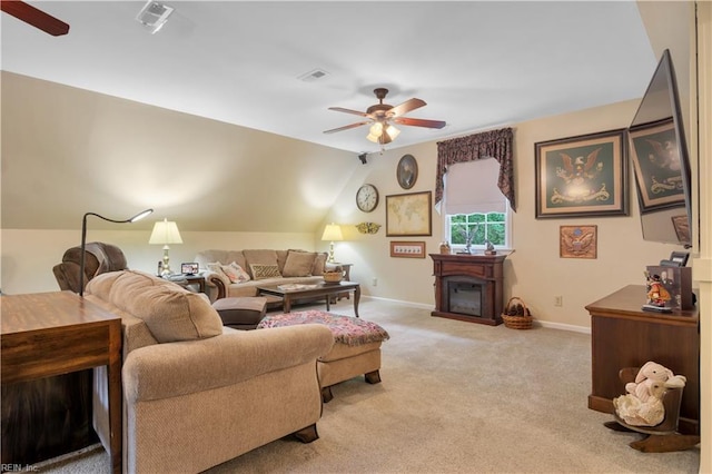 210 John Pott Dr, Williamsburg, VA 23188 - living room featuring ceiling fan, light colored carpet, baseboards, a fireplace, and vaulted ceiling