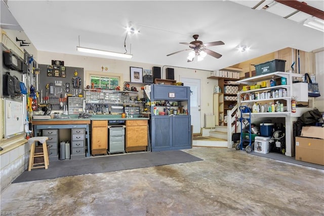 210 John Pott Dr, Williamsburg, VA 23188 - garage with a workshop area and ceiling fan