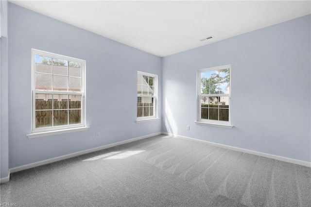 2110 King St, Suffolk, VA 23434 - unfurnished room featuring carpet flooring and baseboards