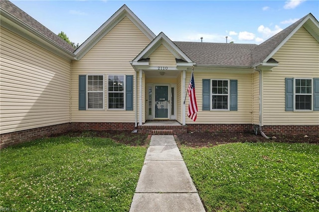 2110 King St, Suffolk, VA 23434 - bungalow-style house featuring a front yard, a shingled roof, and covered porch