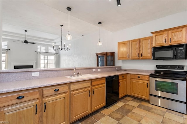 310 Lighthouse Way, Carrollton, VA 23314 - kitchen featuring black appliances, a sink, light countertops, ceiling fan, and hanging light fixtures