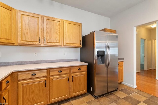 310 Lighthouse Way, Carrollton, VA 23314 - kitchen featuring stainless steel refrigerator with ice dispenser and light countertops