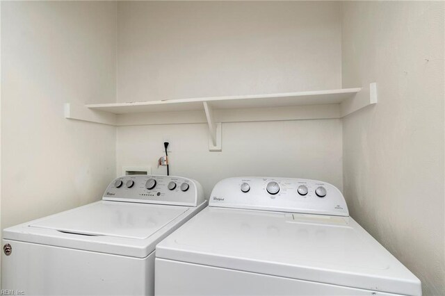 310 Lighthouse Way, Carrollton, VA 23314 - laundry area featuring washer and clothes dryer