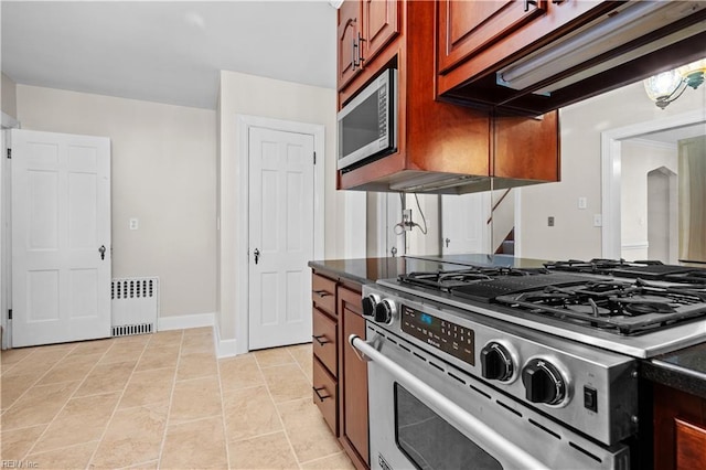 6414 Wythe Pl, Norfolk, VA 23508 - kitchen with appliances with stainless steel finishes, radiator, custom range hood, dark countertops, and baseboards
