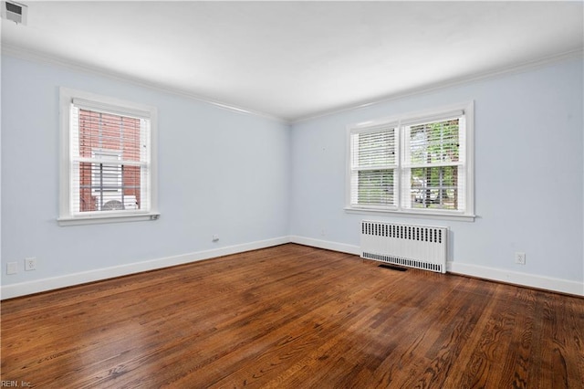 6414 Wythe Pl, Norfolk, VA 23508 - empty room with radiator, ornamental molding, wood finished floors, and baseboards