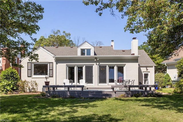 6414 Wythe Pl, Norfolk, VA 23508 - rear view of house featuring a lawn, a deck, brick siding, and a chimney