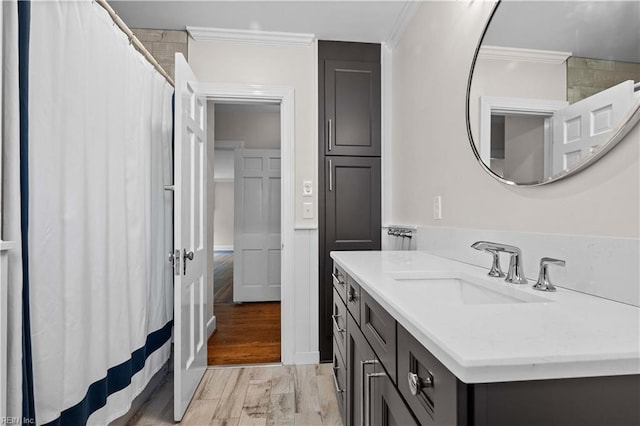 6414 Wythe Pl, Norfolk, VA 23508 - bathroom featuring ornamental molding, vanity, wood finished floors, and curtained shower