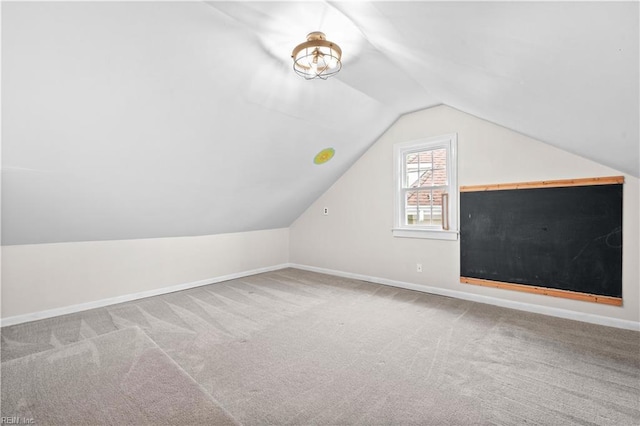 6414 Wythe Pl, Norfolk, VA 23508 - additional living space with lofted ceiling, baseboards, and carpet flooring