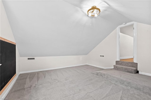 6414 Wythe Pl, Norfolk, VA 23508 - additional living space featuring vaulted ceiling, carpet flooring, and baseboards