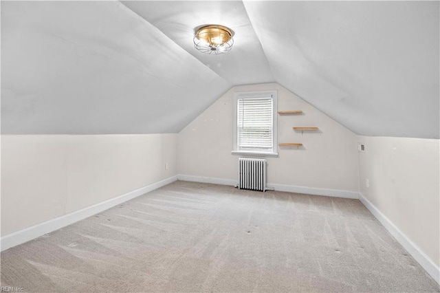 6414 Wythe Pl, Norfolk, VA 23508 - bonus room featuring radiator heating unit, vaulted ceiling, carpet flooring, and baseboards