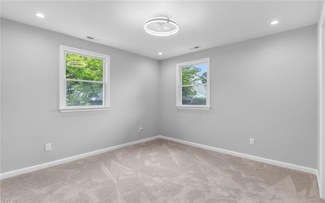 3506 Somme Ave, Norfolk, VA 23509 - unfurnished room with plenty of natural light, carpet, baseboards, and recessed lighting