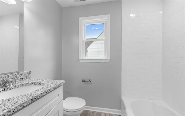 3506 Somme Ave, Norfolk, VA 23509 - bathroom with vanity, toilet, wood finished floors, baseboards, and shower / bathtub combination