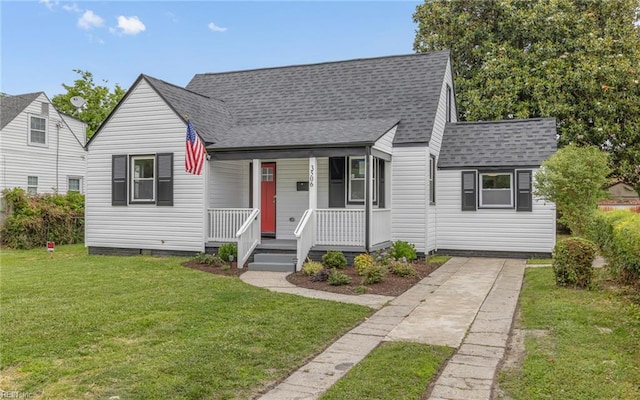 3506 Somme Ave, Norfolk, VA 23509 - view of front of home featuring roof with shingles, a porch, and a front yard