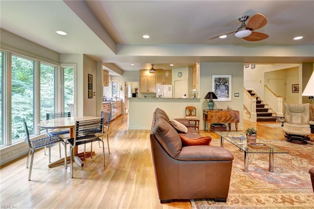 140 Hearthside Ln, Williamsburg, VA 23185 - living area featuring healthy amount of natural light, light wood-style flooring, a ceiling fan, recessed lighting, and stairway
