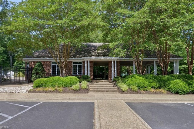 140 Hearthside Ln, Williamsburg, VA 23185 - view of building exterior with uncovered parking
