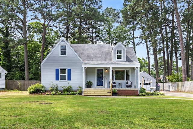 6615 Cabot Ave, Norfolk, VA 23502 - cape cod house featuring a porch and a detached garage