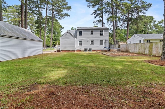 6615 Cabot Ave, Norfolk, VA 23502 - back of house featuring a trampoline and central AC