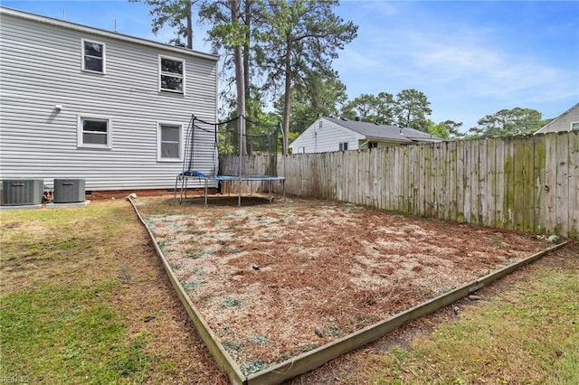 6615 Cabot Ave, Norfolk, VA 23502 - view of yard featuring a trampoline and cooling unit