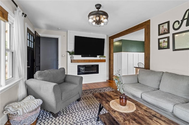 6615 Cabot Ave, Norfolk, VA 23502 - living room with a fireplace and wood finished floors