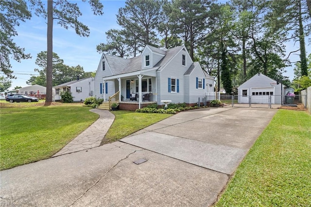 6615 Cabot Ave, Norfolk, VA 23502 - view of front facade featuring covered porch, a detached garage, and an outdoor structure