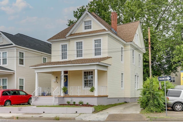 814 E 26th St, Norfolk, VA 23504 - view of front of house with covered porch, a chimney, and a shingled roof