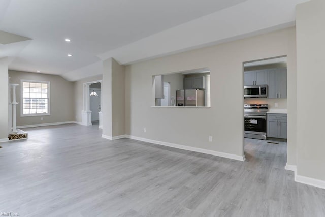 814 E 26th St, Norfolk, VA 23504 - unfurnished living room featuring light wood-style floors, baseboards, and recessed lighting