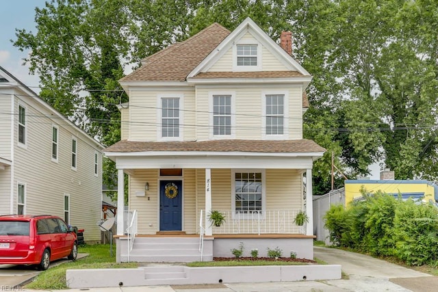 814 E 26th St, Norfolk, VA 23504 - view of front of home featuring a porch, a chimney, and roof with shingles