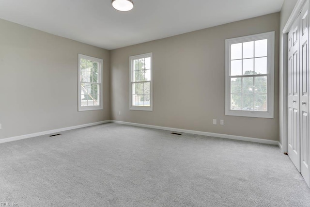 814 E 26th St, Norfolk, VA 23504 - spare room featuring carpet floors and baseboards